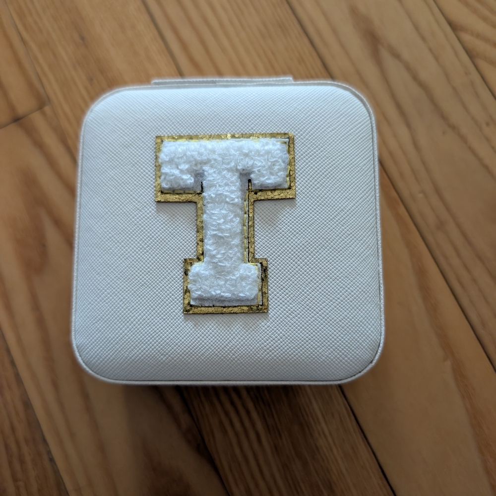 White Jewelry Box with Gold and White 'T' Patch